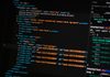 turned on monitor displaying programming language